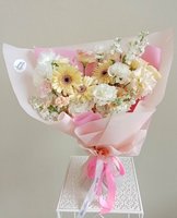 Elegant Cream Dream bouquet featuring gerberas, carnations, and lisianthus, perfect for weddings and anniversaries. Beautiful flowers in Phuket.
